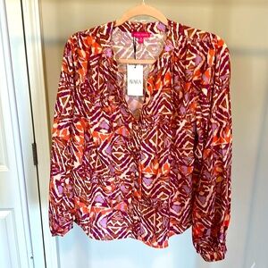 NWT Cute multi colored top for spring, summer or fall.